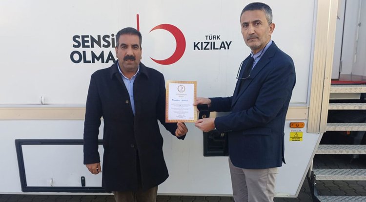 Din görevlisi Bulut’a Kızılay’dan altın madalya