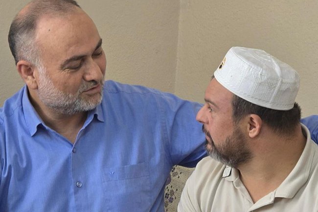 Müftü Taşcı, umreden dönen Down Sendromlu Yavuz’u ziyaret etti